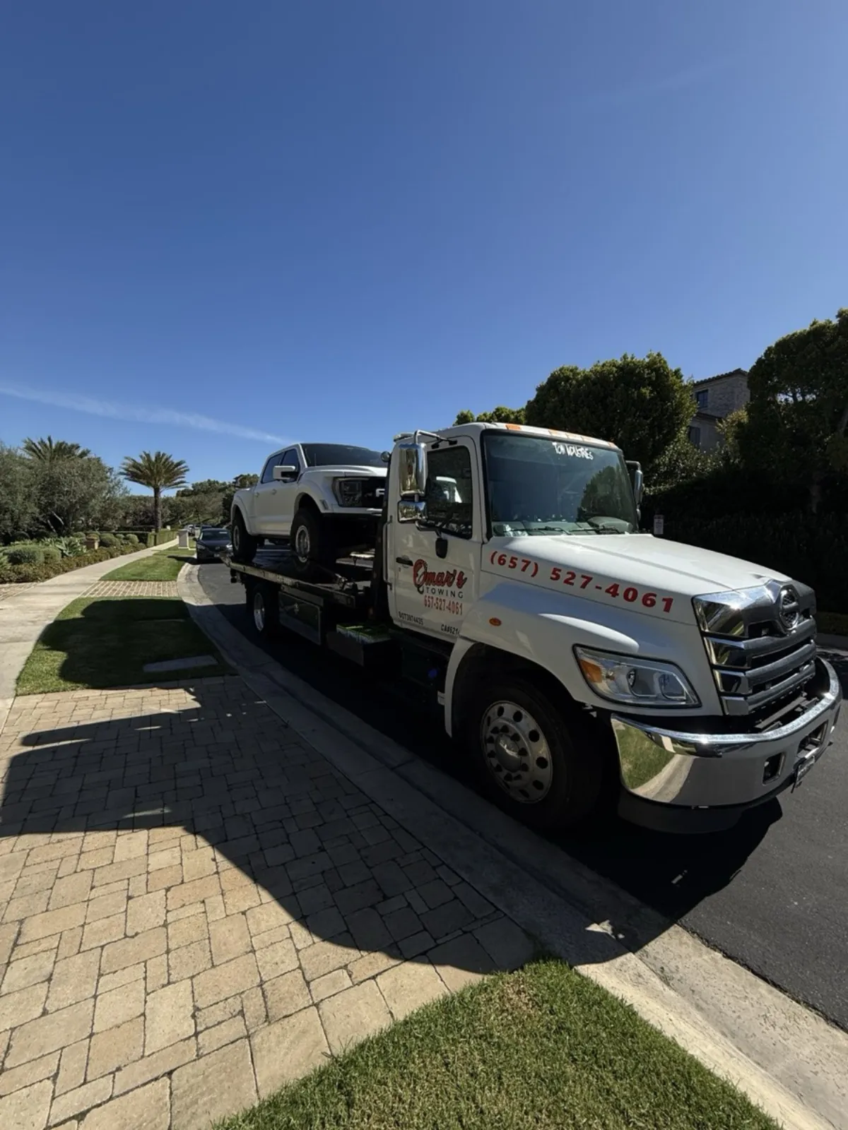 Omar's Towings branded truck